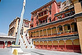 Ladakh - Tikse gompa, the main monastery halls with the characteristc red painted windows and woden balconies